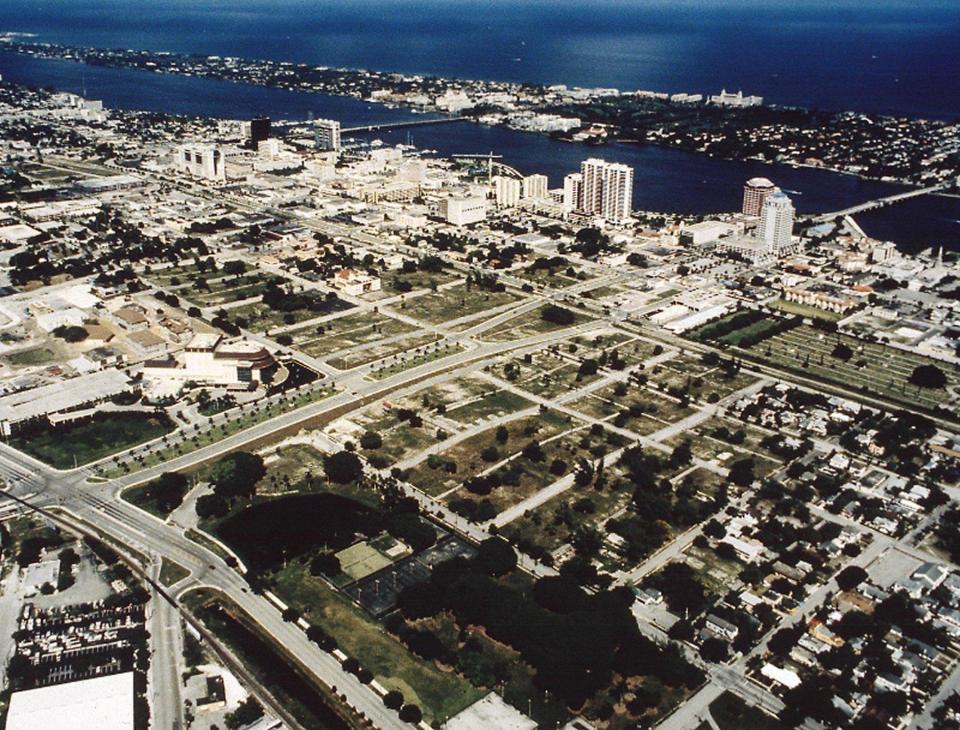 In this mid-1990s aerial image of the Okeechobee Boulevard area just east of I-95 (the Kravis Center is in the left bottom corner), monumental projects such as CityPlace and the Palm Beach County Convention Center are absent.