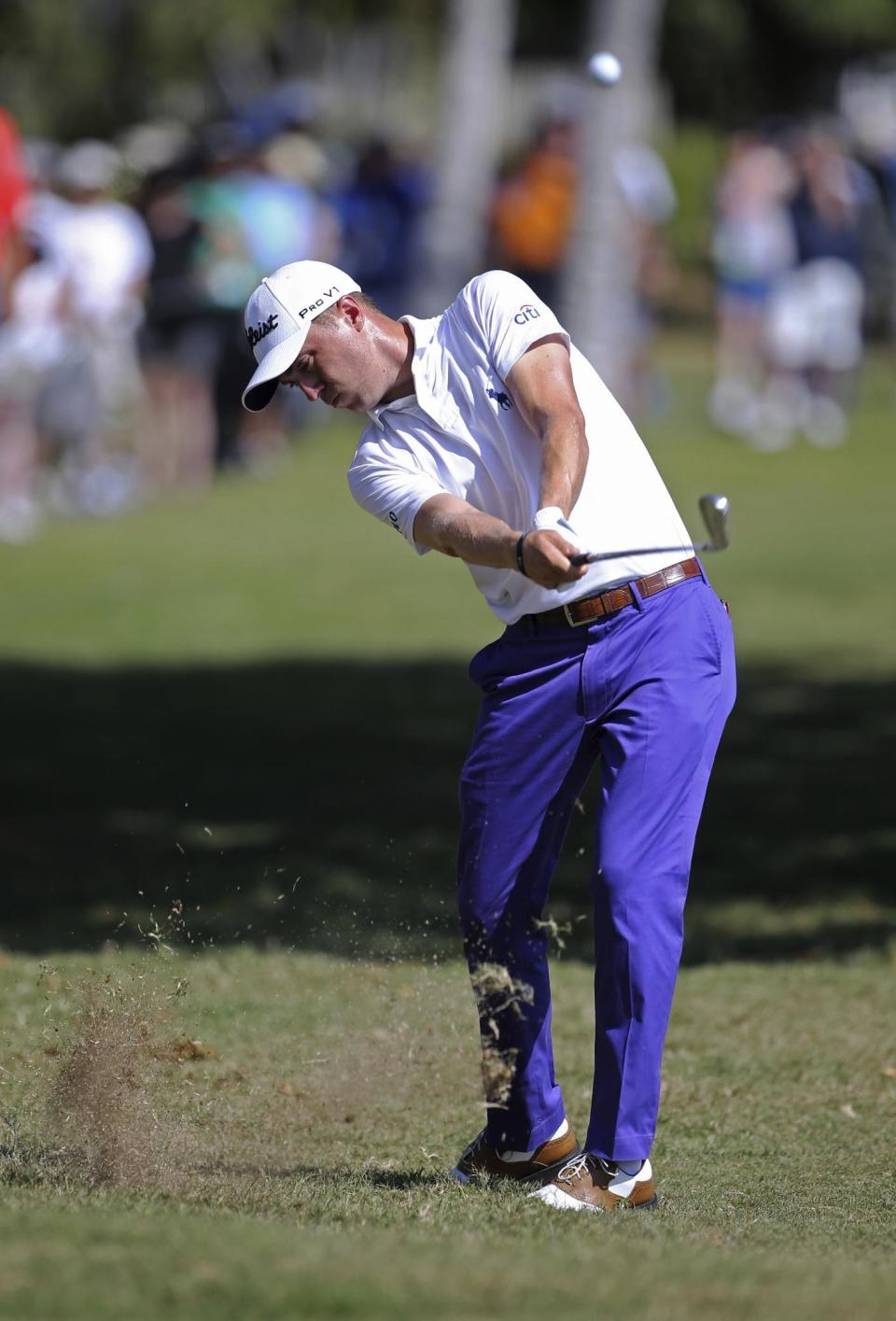 Justin Thomas hits from the third fairway during the second round of the Sony Open golf tournament, Friday, Jan. 13, 2017, in Honolulu. (AP Photo/Marco Garcia)