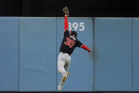 Washington Nationals center fielder Jacob Young makes a leaping catch on a line drive by Los Angeles Dodgers' Austin Barnes during the fourth inning of a baseball game Tuesday, April 16, 2024, in Los Angeles. (AP Photo/Marcio Jose Sanchez)