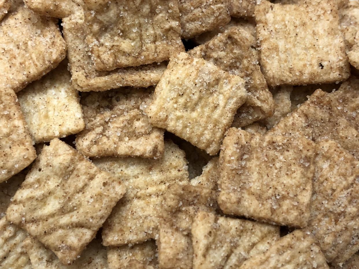 Pile of Cinnamon Toast Crunch cereal.