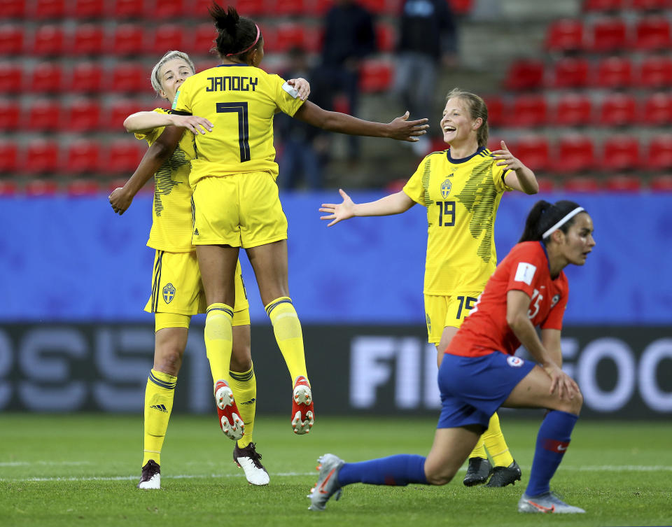 Sweden's Madelen Janogy, 2nd left, celebrates after scoring her side's 2nd goal during the Women's World Cup Group F soccer match between Chile and Sweden at the Roazhon Park in Rennes, France, Tuesday, June 11, 2019. (AP Photo/David Vincent)