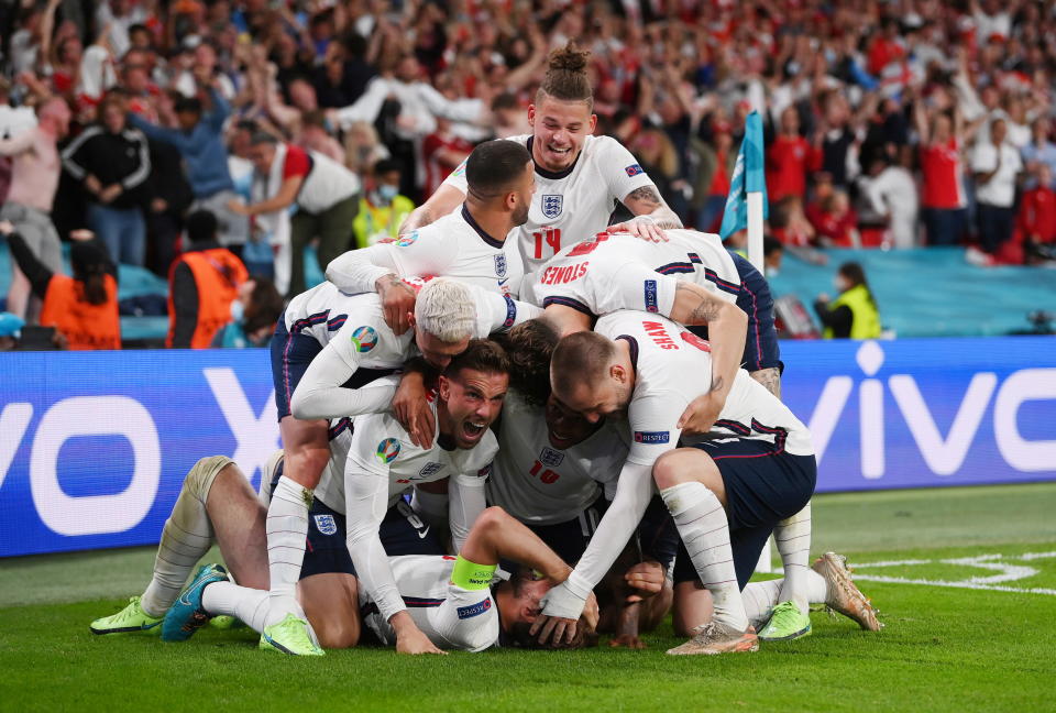 Pictured here, England players celebrate their semi-final victory at Euro 2020.