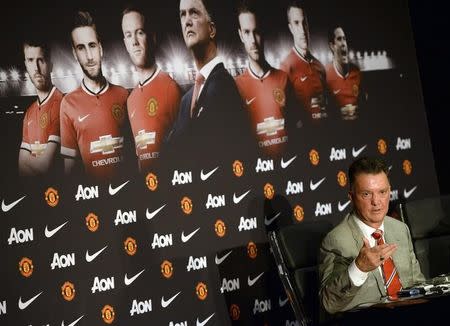 New Manchester United manager Louis Van Gaal speaks to the media during a news conference at the club's Old Trafford Stadium in Manchester, northern England, July 17, 2014. REUTERS/Nigel Roddis