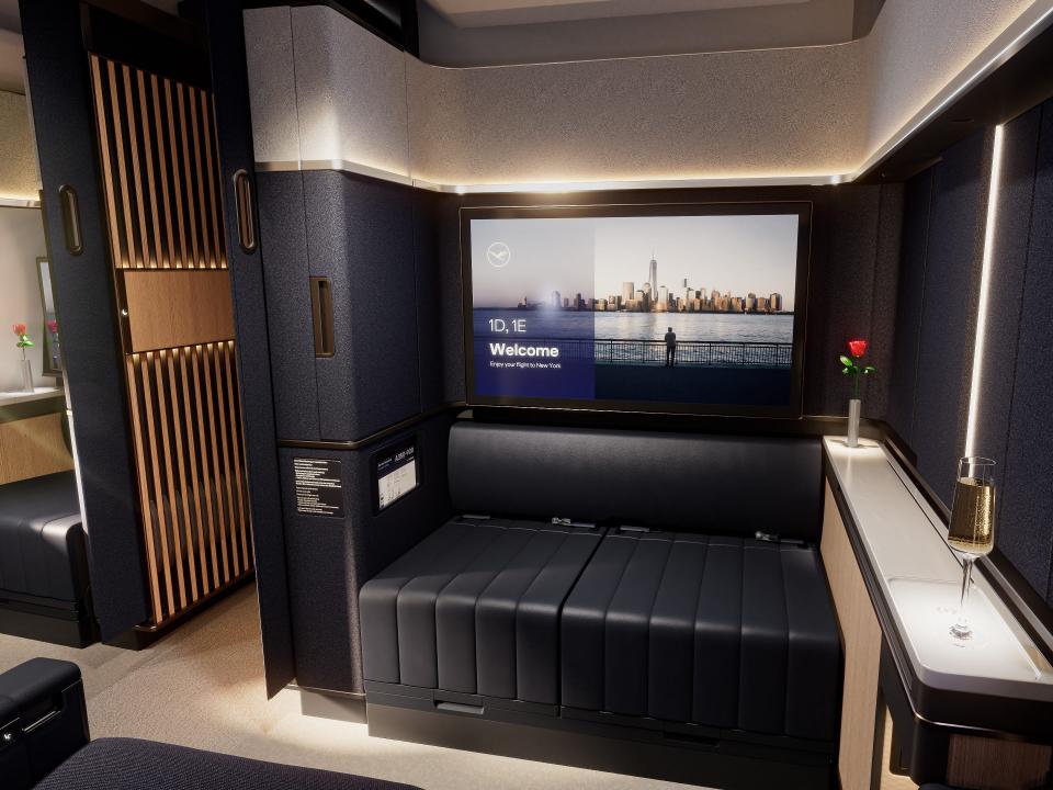 Lufthansa new Allegris first-class suites: Interior photo showing the seating and a large TV screen