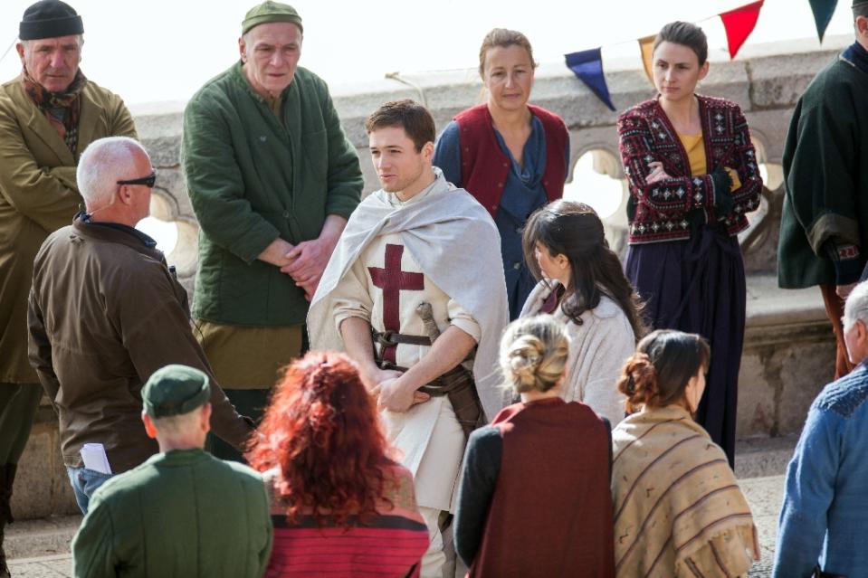 Actor Taron Egerton as “Robin Hood” (C-L) and actress Eve Hewson as “Maid Marian” (C-R) play during the film shooting of “Robin Hood: Origins” in Dubrovnik, Croatia, on February 20, 2017 (AFP Photo)