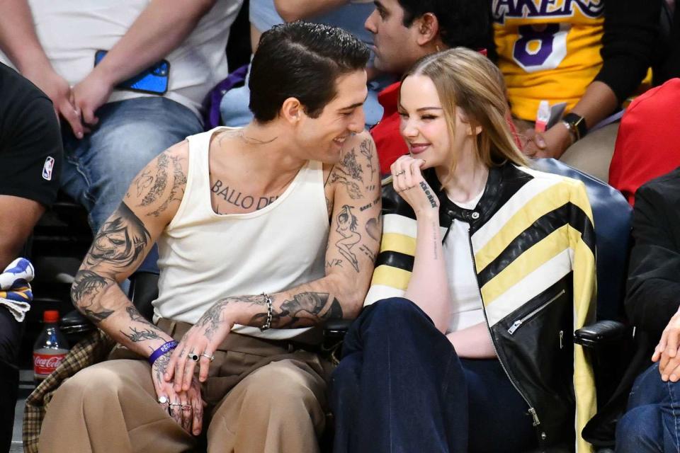 <p> Allen Berezovsky/Getty</p> Dove Cameron and Damiano David at the Lakers game on Feb. 13, 2024 in Los Angeles