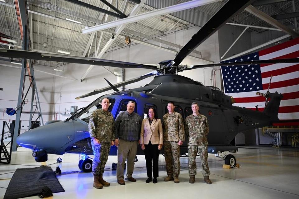 Dignitaries stand in front of a MH-139$ Grey Wolf helicopter following its arrival ceremony on Friday, March 9. From left to right are Gen. Thomas Bussiere, commander, Air Force Global Strike Command, Montana Senator Jon Tester, Kathleen Jolivette, vice-president and general manager of Boeing Vertical Lift, Col. Philip Bryant, 582nd Helicopter Group commander, and Lt. Col. Tyler Williams, 550th Helicopter Squadron commander.