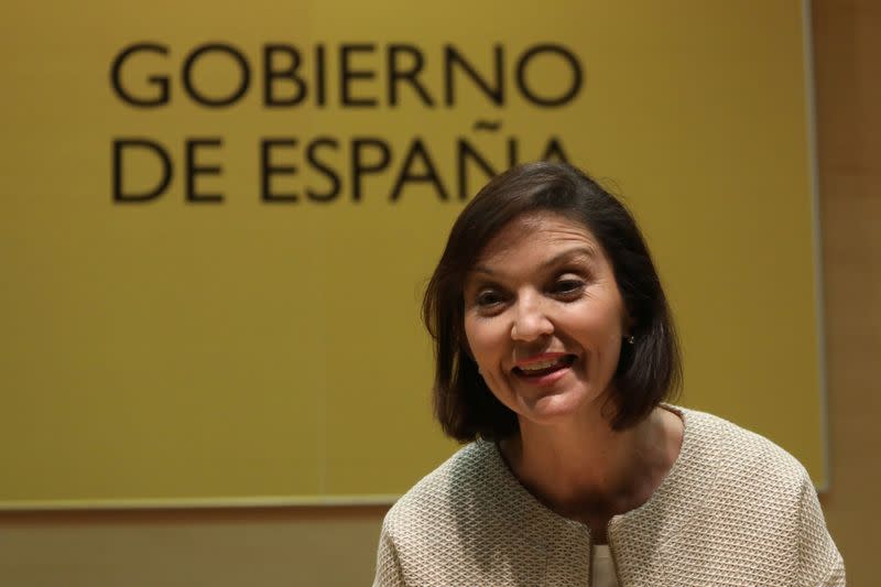 Spain's new Industry Minister Reyes Maroto reacts during her taking over ceremony at the Ministry of Economy in Madrid