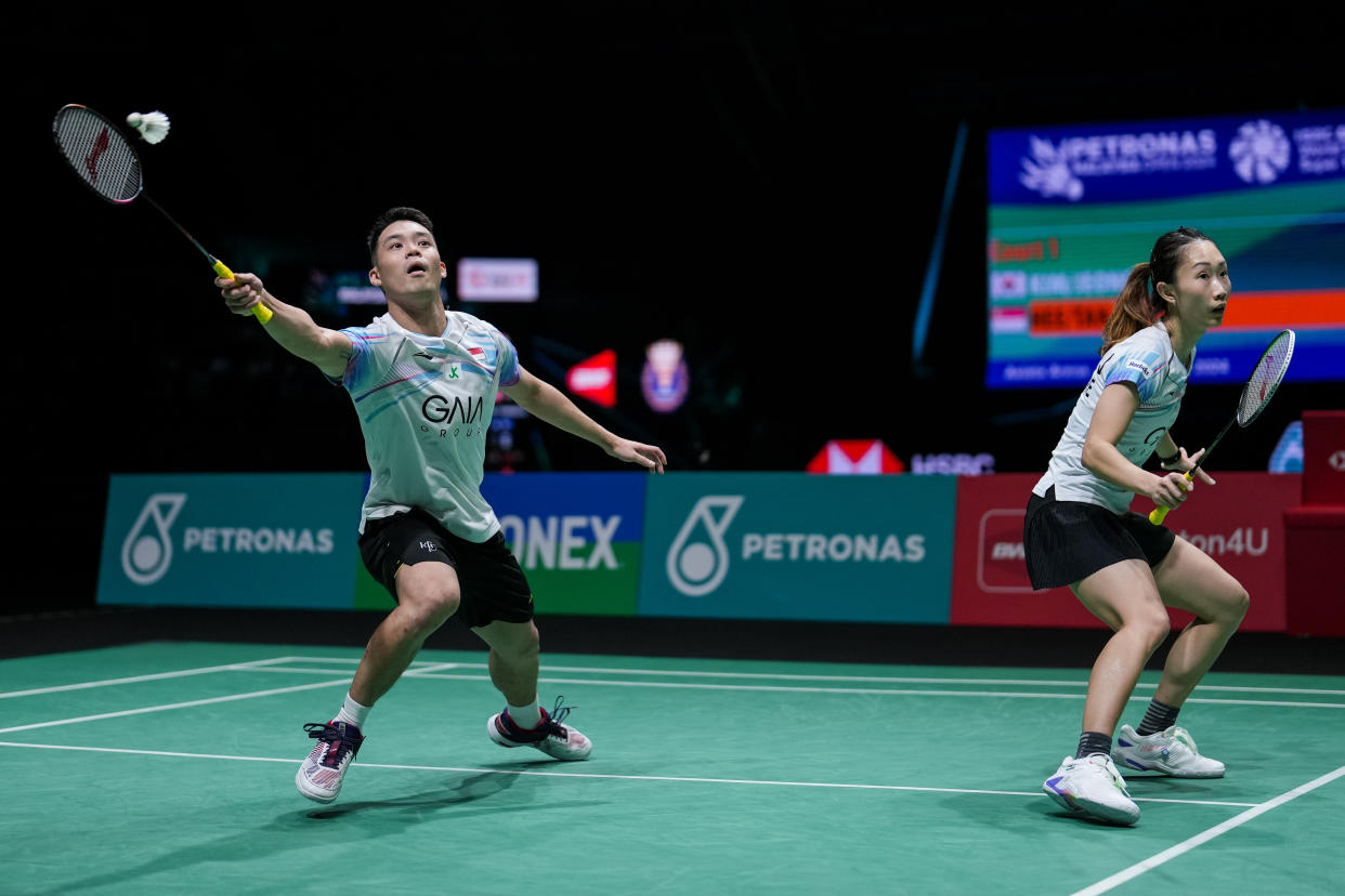 Singapore mixed doubles badminton duo Terry Hee (left) and Jessica Tan during their semi-final clash with South Korea's Kim Won-ho and Jeong Na-eun at the 2024 Malaysia Open. 
