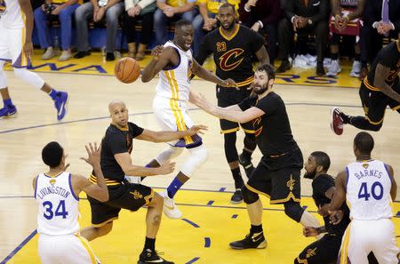 June 19, 2016; Oakland, CA, USA; Golden State Warriors forward Draymond Green (23) passes the ball to guard Shaun Livingston (34) against Cleveland Cavaliers forward Richard Jefferson (24), forward Kevin Love (0) and forward LeBron James (23) in the second half in game seven of the NBA Finals at Oracle Arena. Mandatory Credit: Kelley L Cox-USA TODAY Sports