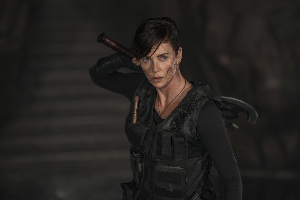 This image released by Netflix shows Charlize Theron in a scene from "The Old Guard." (Aimee Spinks/Netflix via AP)