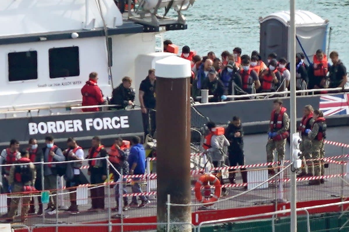 A group of people thought to be migrants are brought in to Dover, Kent, from a Border Force vessel following a small boat incident in the Channel on Thursday (Gareth Fuller/PA) (PA Wire)