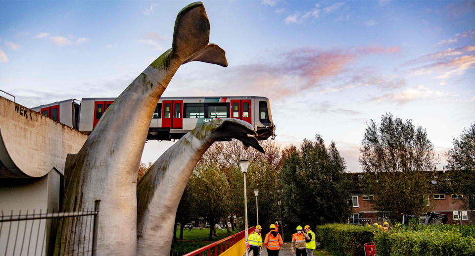 A train shown stopped on a structure of whale tail in the Netherlands.