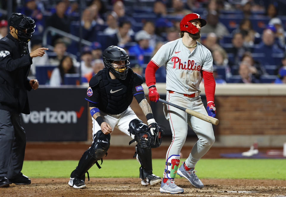 Philadelphia Phillies' Bryce Harper reacts after striking out against the New York Mets during the eighth inning of a baseball game, Monday, May 13, 2024, in New York. (AP Photo/Noah K. Murray)