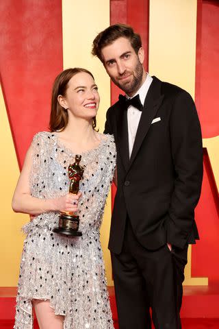 <p>Amy Sussman/Getty</p> Emma Stone and Dave McCary attend the 2024 Vanity Fair Oscar Party on March 10, 2024, in Beverly Hills, California