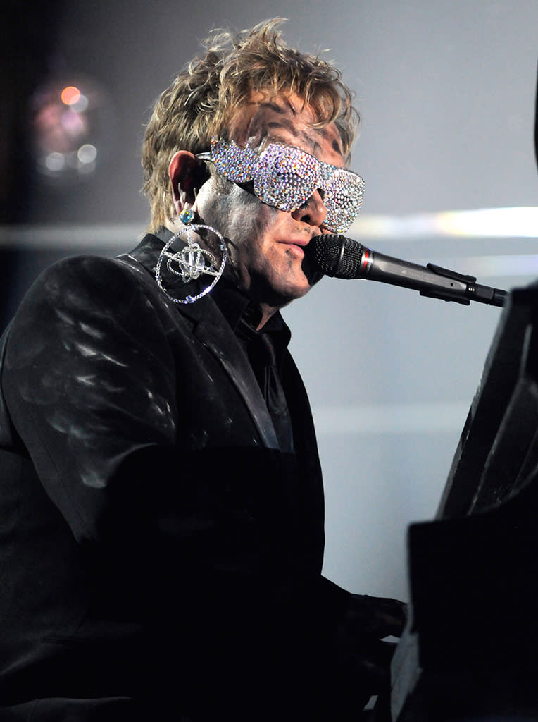 Elton John wearing sunglasses in 2010