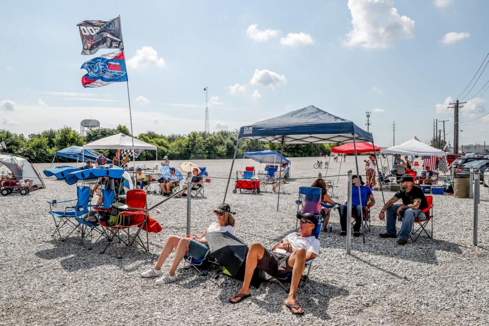 Fans set up along 16th Street outside Indianapolis Motor Speedway before the 104th running of the Indianapolis 500 on Sunday, August 23, 2020. This year's race takes place without fans allowed inside the track due to the COVID-19 pandemic.