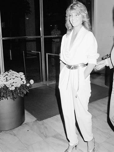 Heather Locklear in a white jumpsuit, 1983