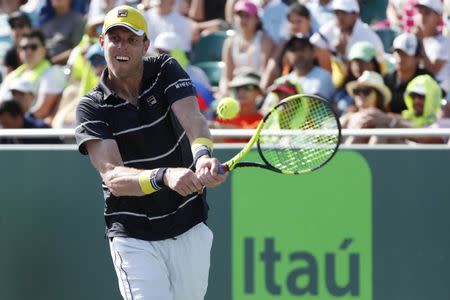 FILE PHOTO: Mar 26, 2018; Key Biscayne, FL, USA; Sam Querrey of the United States has a backhand against Denis Shapovalov of Canada (not pictured) on day seven of the Miami Open at Tennis Center at Crandon Park. Geoff Burke-USA TODAY Sports