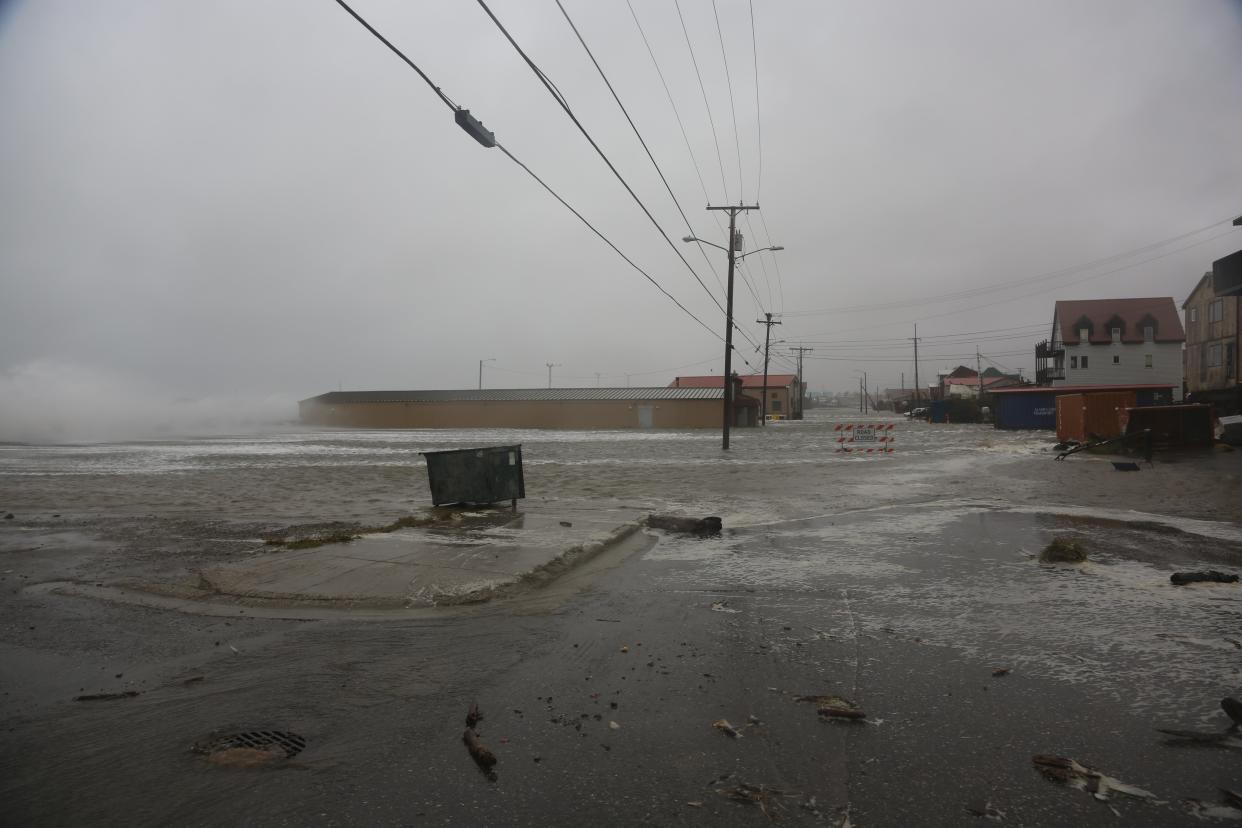 Water surrounds the Mini Convention Center, which is also home to the finish of the Iditarod Trail Sled Dog Race, in Nome, Alaska, on Saturday, Sept. 17, 2022. (Peggy Fagerstrom / AP)