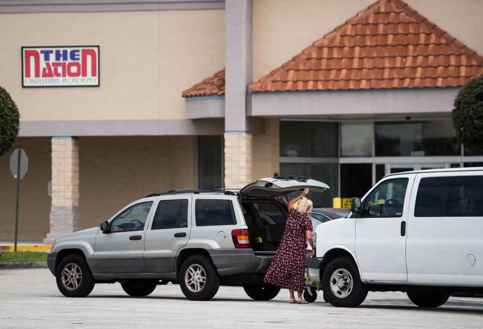 Activity is seen at Barnabas Christian Academy, formerly The Nation Christian Academy, on Friday, March 1, 2019, a day before the Port St. Lucie property's landlord said hired security will evict the school. 