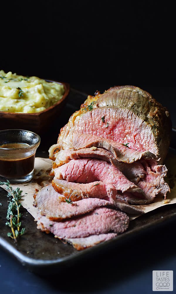 <p>The garlicky crust is everything.</p><p>Get the recipe from <a rel="nofollow noopener" href="http://ourlifetastesgood.blogspot.com/2015/11/garlic-roast-beef.html" target="_blank" data-ylk="slk:Life Tastes Good;elm:context_link;itc:0;sec:content-canvas" class="link ">Life Tastes Good</a>.</p>