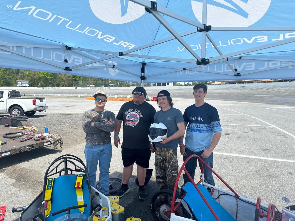 Bobby Kenndy, Damon Welch, Jack Strause and Landon Andrus competing in the Electrathon America 120 at Five Flags Speedway