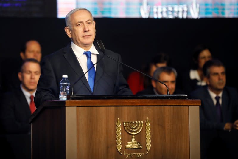 FILE PHOTO: Israeli Prime Minister Benjamin Netanyahu addresses members of his right-wing party bloc at a conference in Tel Aviv