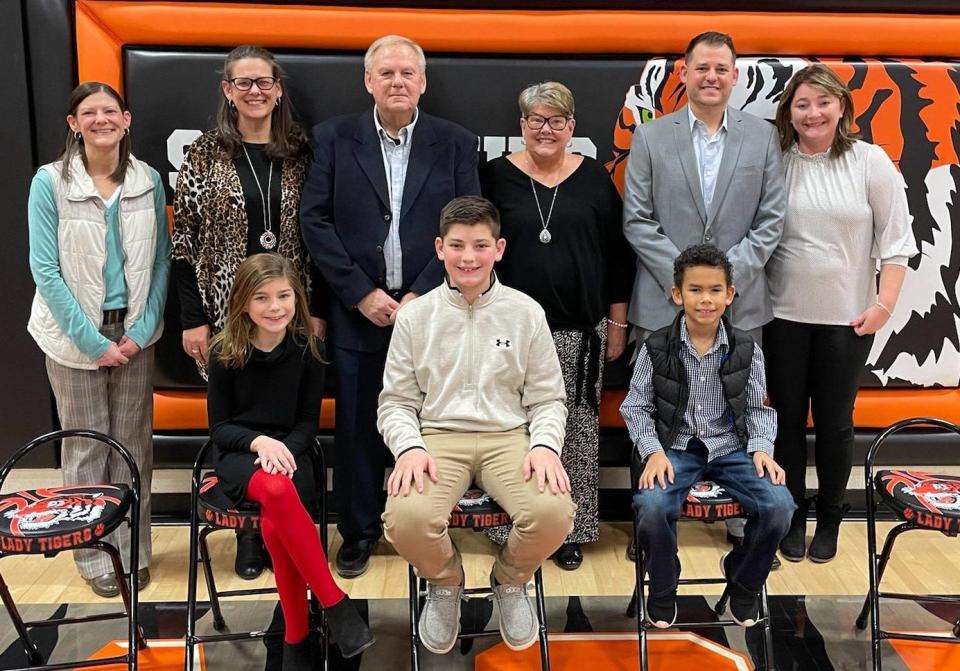 Ron Hurst and his family celebrate after his induction.