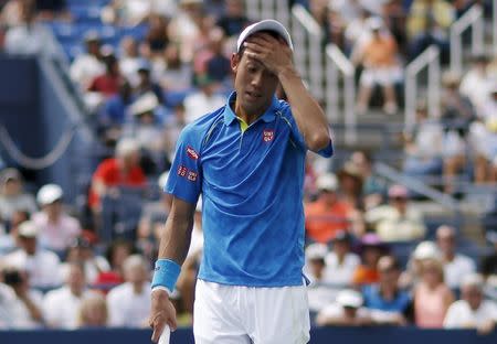 Kei Nishikori of Japan reacts after losing a point to Benoit Paire of France during their match at the U.S. Open Championships tennis tournament in New York, August 31, 2015. REUTERS/Mike Segar Picture Supplied by Action Images