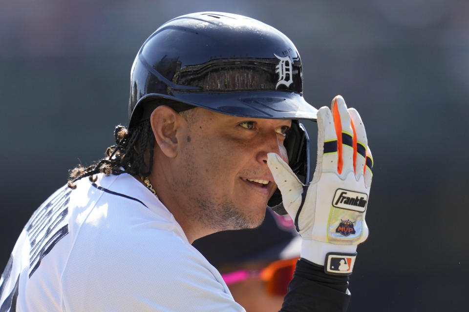 Detroit Tigers' Miguel Cabrera reacts to the dugout after advancing to third base against the Cleveland Guardians in the fourth inning of a baseball game, Saturday, Sept. 30, 2023, in Detroit. (AP Photo/Paul Sancya)