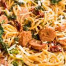 <p>This meaty <a href="https://www.delish.com/uk/cooking/recipes/a28841234/three-ingredient-spaghetti-recipe/" rel="nofollow noopener" target="_blank" data-ylk="slk:spaghetti;elm:context_link;itc:0;sec:content-canvas" class="link ">spaghetti</a> in a cream sauce is the whole package for an easy dinner.</p><p>Get the <a href="https://www.delish.com/uk/cooking/recipes/a31656606/spaghetti-with-sun-dried-tomatoes-sausage-and-spinach-recipe/" rel="nofollow noopener" target="_blank" data-ylk="slk:Spaghetti with Sun-Dried Tomatoes, Sausage & Spinach;elm:context_link;itc:0;sec:content-canvas" class="link ">Spaghetti with Sun-Dried Tomatoes, Sausage & Spinach</a> recipe.</p>