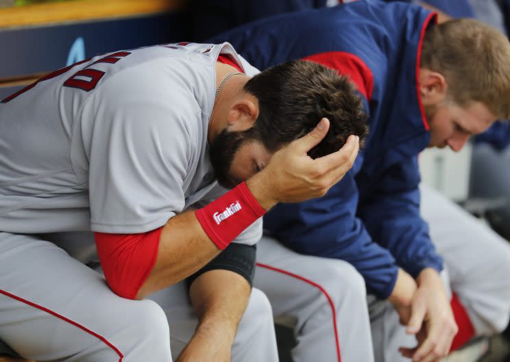 Boston Red Sox's Mitch Moreland, left, and Chris Sale sit on the bench against the Detroit Tigers in the seventh inning of a baseball game in Detroit, Monday, April 10, 2017. Detroit won 2-1. (AP Photo/Paul Sancya)