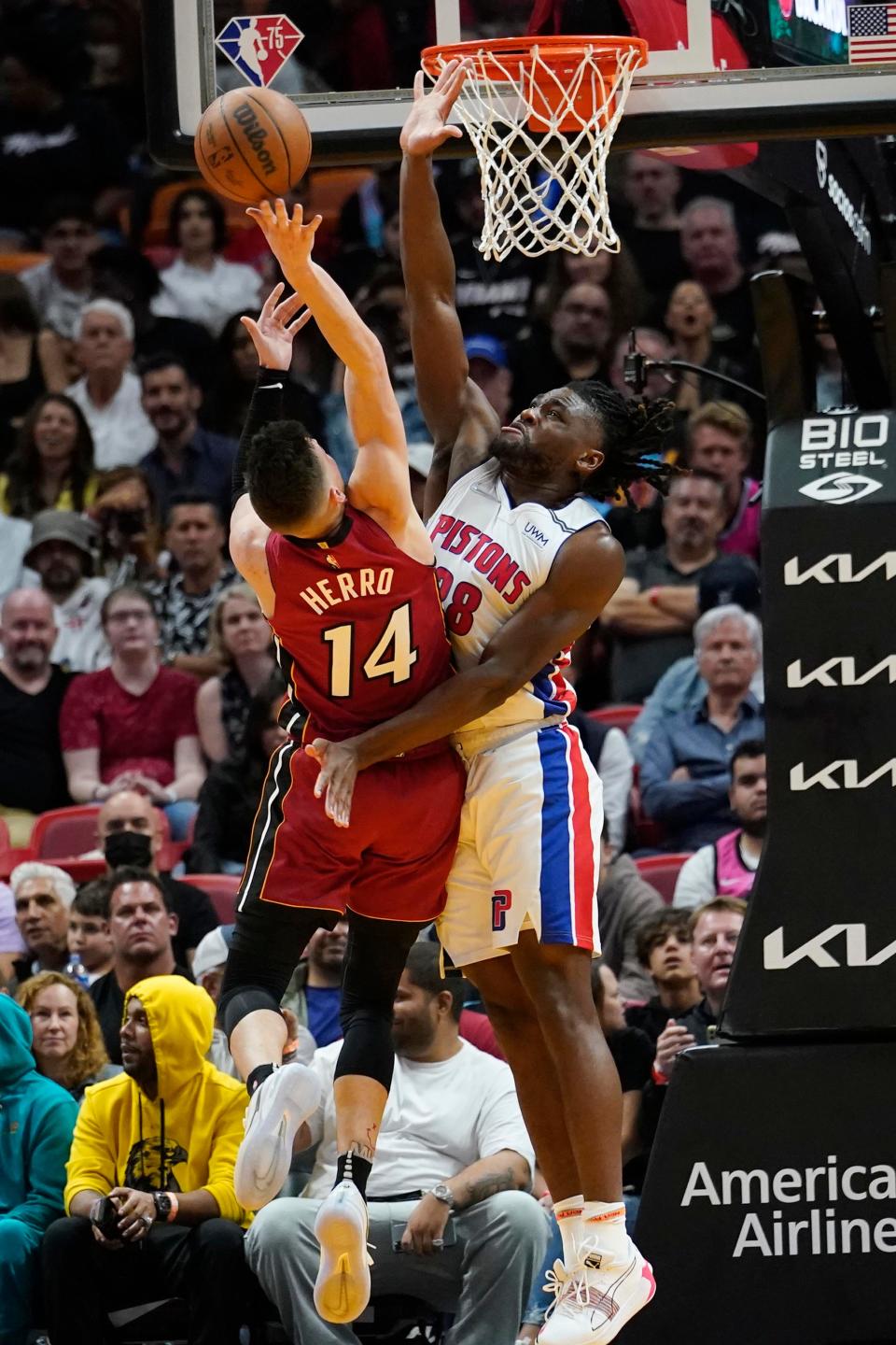 Miami Heat guard Tyler Herro drives to the basket as Detroit Pistons center Isaiah Stewart defends during the first half Tuesday, March 15, 2022, in Miami.