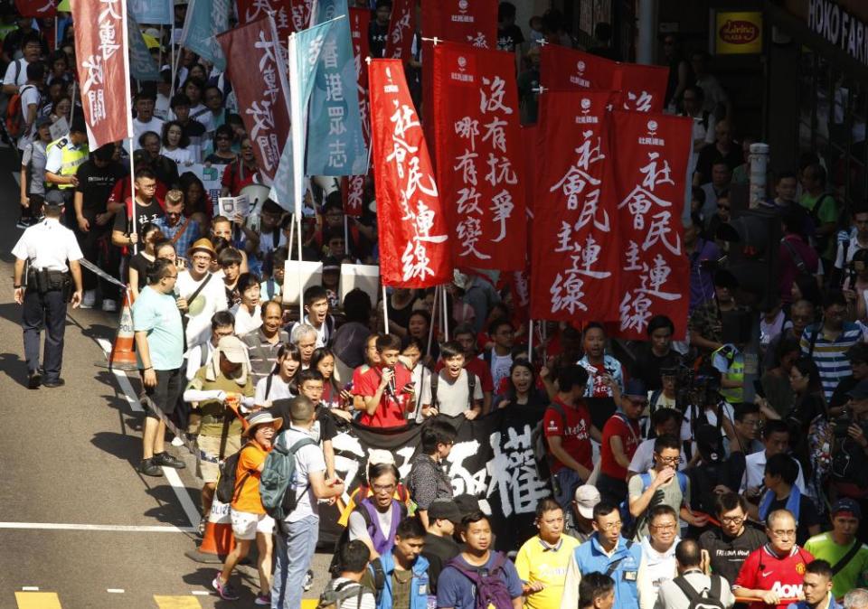 Thousands of people take to the streets in Hong Kong.