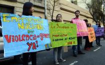 Activists demand an urgent solution to problems of gender violence, near the National Congress in Buenos Aires, Argentina, where more than 1,800 women have been killed in domestic violence in the past seven years