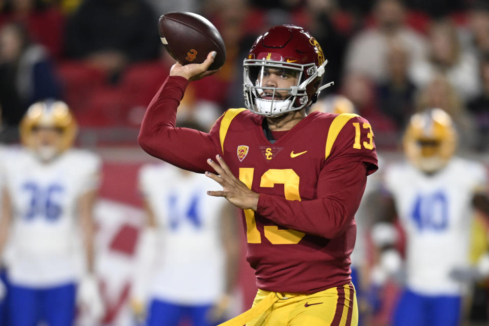 FILE - Southern California quarterback Caleb Williams throws a pass against California during the first quarter of an NCAA college football game Saturday, Nov. 5, 2022, in Los Angeles. Southern California quarterback Caleb Williams was named the AP Player of the Year in college football, Thursday, Dec. 8, 2022. (AP Photo/John McCoy, File)