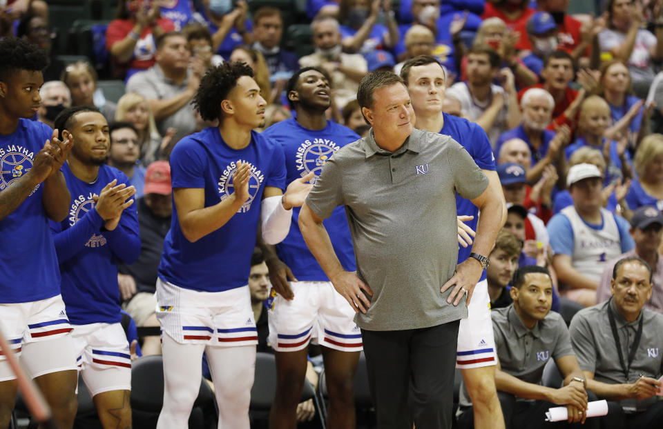Kansas head coach Bill Self looks on during the first half of a NCAA college basketball game against North Texas on Thursday, Nov. 25, 2021, in Orlando, Fla. (AP Photo/Jacob M. Langston)