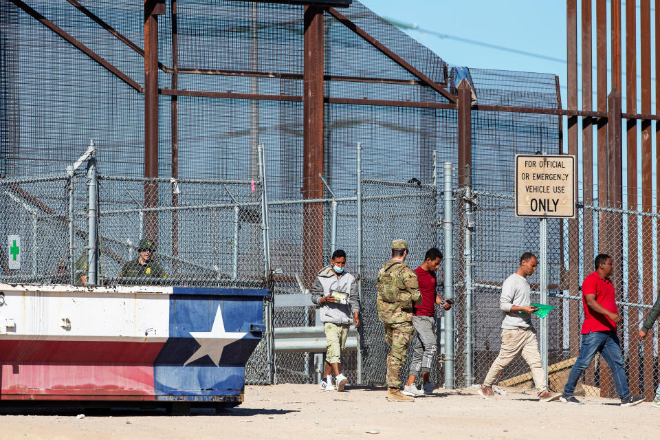 Migrants enter El Paso, Texas from Ciudad Juarez, Mexico on May 10, 2023. (Andres Leighton / AP)