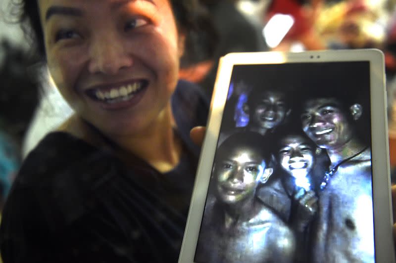 PHOTOS: Divers rescue all 13 from flooded cave in Thailand