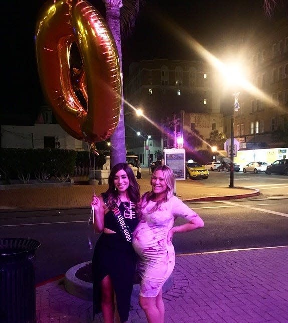 Writer Erin Jensen with her sister-in-law/bestie Amanda Jensen, who attended the festivities just weeks before giving birth.