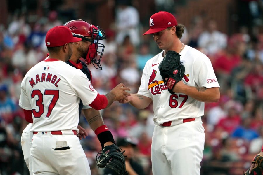 St. Louis Cardinals starting pitcher Gordon Graceffo (67) is removed by manager Oliver Marmol (37) during the fourth inning in the second game of a baseball doubleheader against the Kansas City Royals Wednesday, July 10, 2024, in St. Louis. (AP Photo/Jeff Roberson)