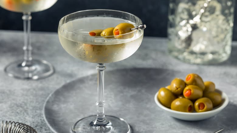 ice cold martini with olives