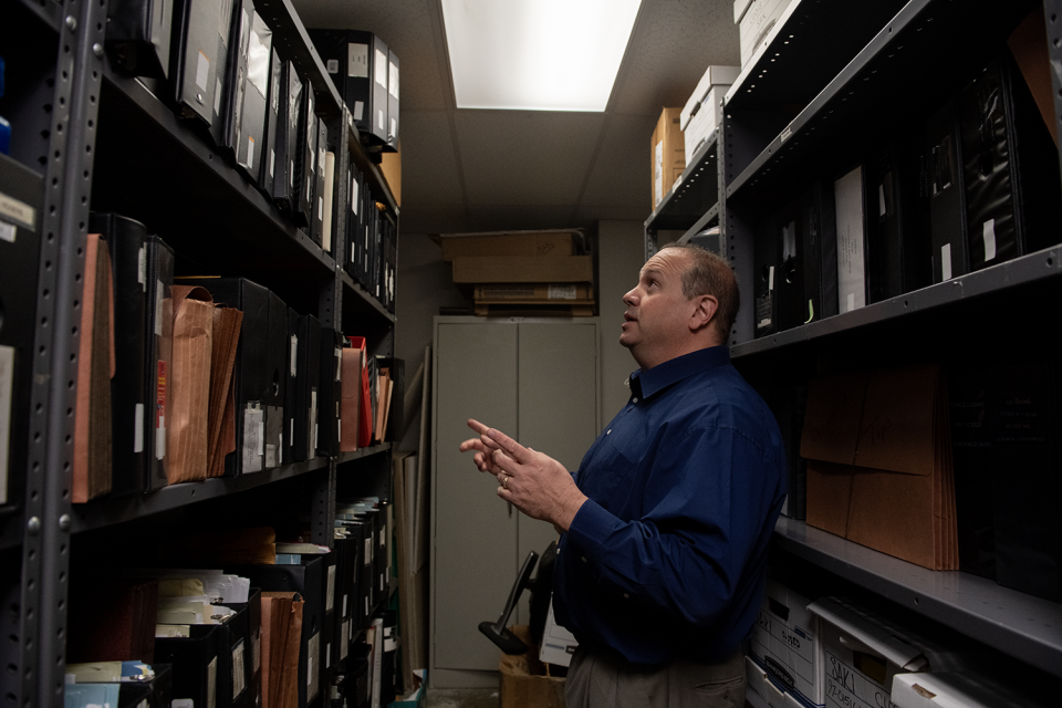 Lt. David Whiddon gives a tour of the cold case room at the Akron Police Department on a recent morning. Whiddon is hopeful the 2011 murder of Alex Wells can be solved if someone is willing to talk.