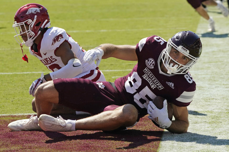 Mississippi State wide receiver Austin Williams (85) rolls in the end zone with a 10-yard touchdown reception against Arkansas during the first half of an NCAA college football game in Starkville, Miss., Saturday, Oct. 8, 2022. (AP Photo/Rogelio V. Solis)