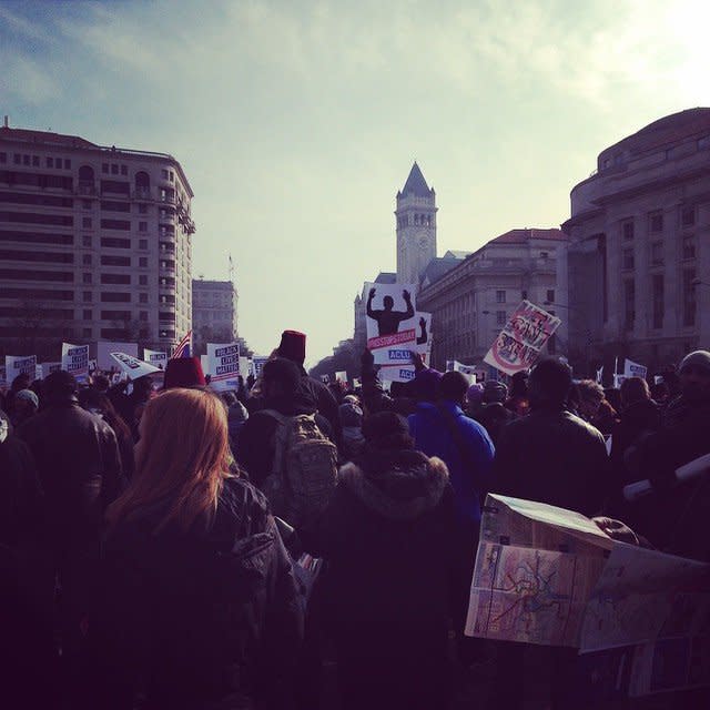 Protesters gather in Freedom Plaza for a march to the capitol in Washington, DC on Saturday, Dec. 13, 2014. 