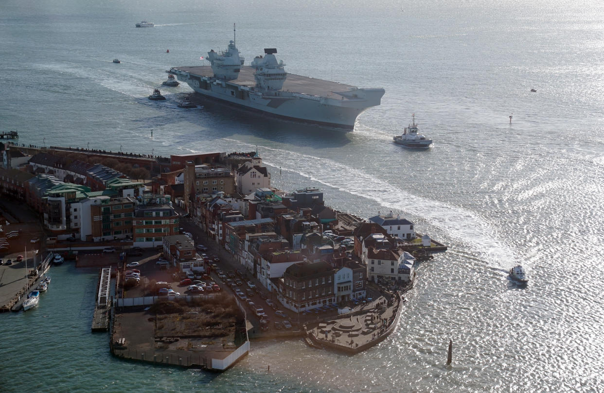 Royal Navy aircraft carrier HMS Prince of Wales arrives back into Portsmouth Harbour as seen from the Spinnaker Tower, after undergoing exercises. The aircraft carrier is currently serving as the Nato command ship for the next year, after the Royal Navy took charge of Nato's fast reaction maritime task force formed to tackle major incidents around the world. Picture date: Friday February 4, 2022.