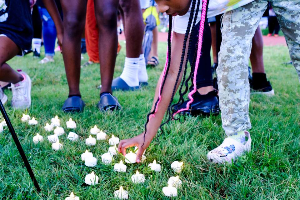 More than 100 people attended Thursday evening's candlelight vigil in honor of Lyndsey Vicknair.