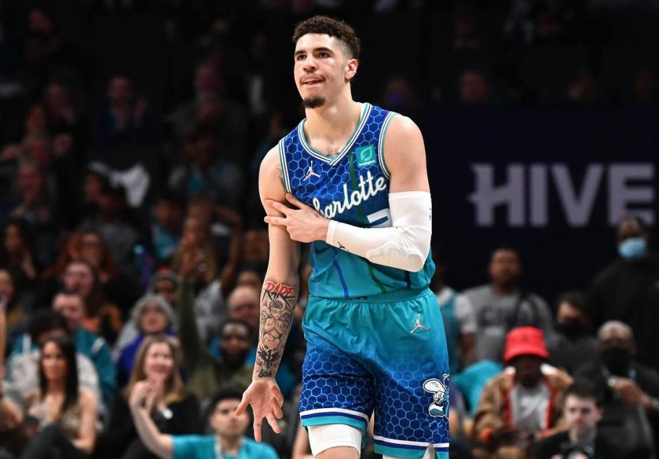 Charlotte Hornets guard LaMelo Ball celebrates a three-point basket during first half action against the Utah Jazz at Spectrum Center in Charlotte, NC on Friday, March 25, 2022.