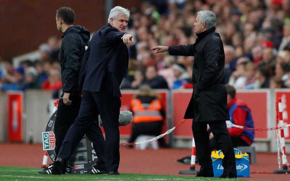 Mourinho shook the hands of Hughes' backroom staff but ignored the manager - Action Images via Reuters